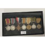 A group of seven medals, China War Medal (1900) and bar, Relief of Peking,