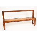 A 19th Century pine bench, with plain back rail, 179cm wide, 32cm deep,