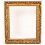 A large Spanish plate gilt picture frame, 103cm x 85cm sight, recess is 108cm x 90cm,