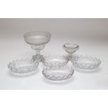 A circular cut glass footed bowl with diamond,