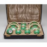 A Royal Worcester green-ground coffee service for six in a presentation case,