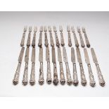A set of twelve silver desert knives and forks, Aaron Hadfield, Sheffield 1924 & 1927,
