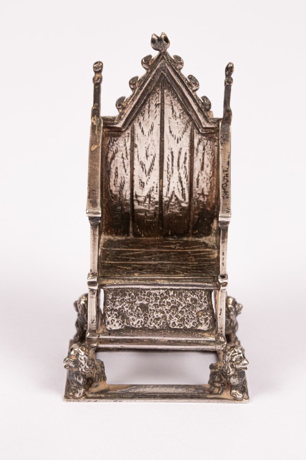 An Edwardian silver model of the Coronation Chair,