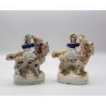 Two Staffordshire figures of a girl riding a goat, one in pottery, the other porcelaneous,
