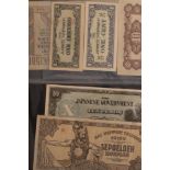 A album of world bank notes to include Chinese, Korean, Japanese, French and Spanish etc.