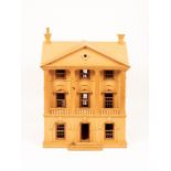 A Regency style dolls house with Neoclassical frontage, pillar supports and balustrade balcony,