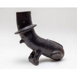 A South American pottery vessel in the form of an animal in a top hat, possibly Colombian,