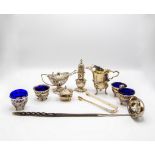 A quantity of silver cruets, various dates and makers,