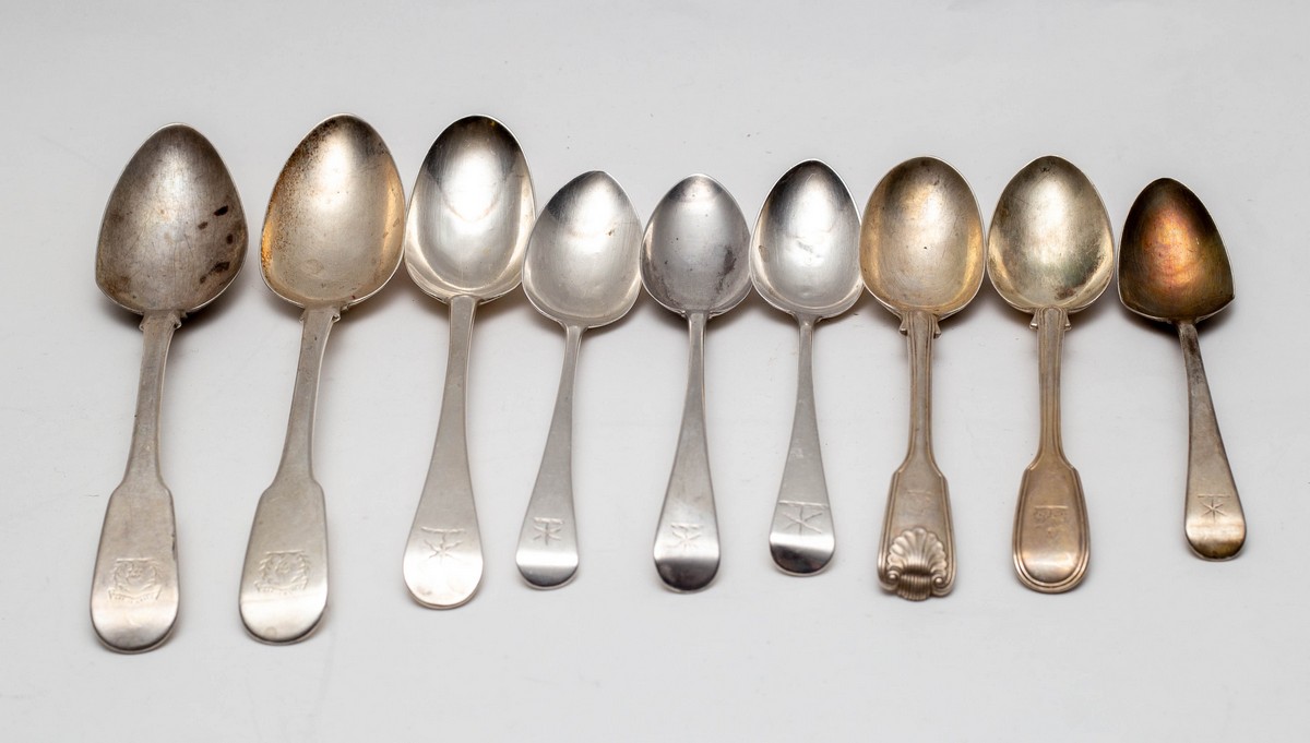 Nine silver spoons, various makers and dates, 19th Century, all with crested handles,