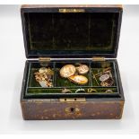 A quantity of 9ct gold and other jewellery including cameo brooches and dress rings contained in a