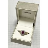 An 18t gold ruby and diamond ring, diamond 0.