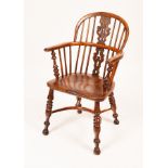 A yew wood and elm Windsor chair, 19th Century,