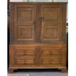 A 20th Century oak cupboard,