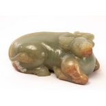 A Chinese celadon jade recumbent buffalo, 19th/20th Century,