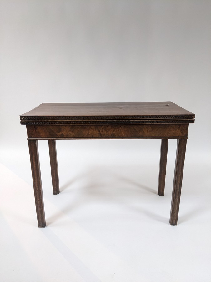 A George III mahogany card table,