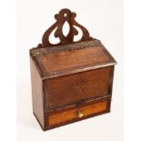 A George III oak and mahogany crossbanded candle box,