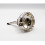 A George IV silver wine funnel, Charles Eley, London 1827, in two parts, crested with shell handle,
