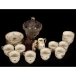 An English porcelain part service of five tea bowls,