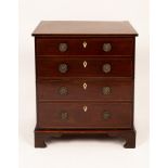 A 19th Century mahogany chest of four drawers with bone escutcheons, on bracket feet,