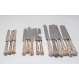 A set of six Edwardian silver handled knives, Daniel & John Wellby, London 1904,