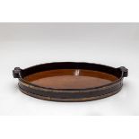 A George III mahogany and brass bound oval tray, 62cm wide/Provenance: Jasper Marsh,