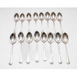 A set of seven German silver teaspoons, 800 standard, with monogrammed handles,