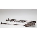 A set of three burnished steel fire irons,