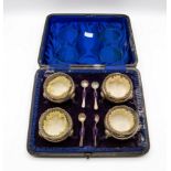 A cased set of four silver salts with spoons, Williams Ltd.