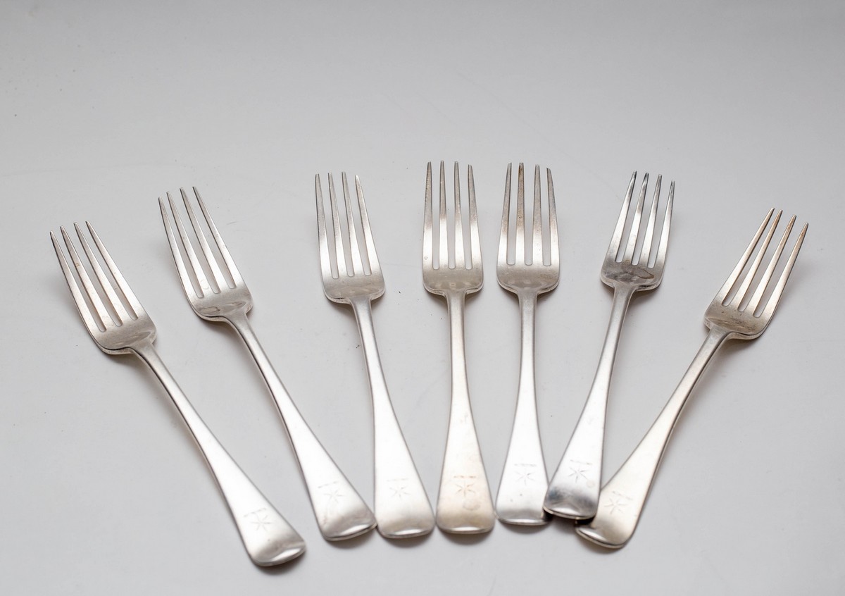 A matched set of seven silver forks, various makers, mid 19th Century,