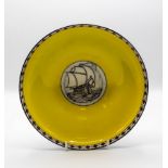 A Royal Worcester circular bowl with central medallion of a galleon, after Walter Crane,