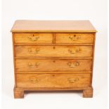 A George III mahogany chest of three long and two short drawers,