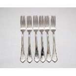 A set of six Danish silver forks, Peter Henningsen, marked 800, with pointed handles,