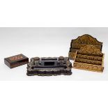 A 19th Century papier-mâché inkstand and pen tray inlaid mother-of-pearl and fitted with two ink