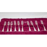 A matched set of ten silver forks, various makers, 19th Century, rat-tail pattern, engraved verso,