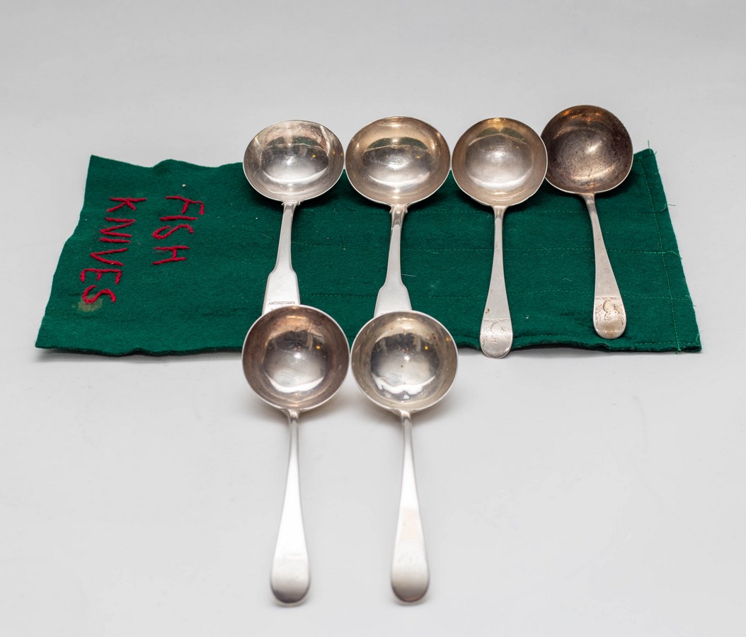 A pair of George III silver ladles, makers mark RC, London 1785, and four other silver ladles,