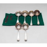 A pair of George III silver ladles, makers mark RC, London 1785, and four other silver ladles,