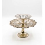 An Edwardian silver tazza, Birmingham 1910, the pierced top with scrolling rim,