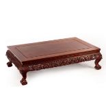 A Chinese hardwood coffee table, 20th Century,