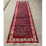 A Malayir runner, West Persia, the indigo field with an all over Herati design,