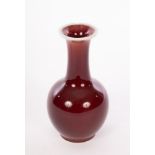 A Chinese red monochrome vase, 20th Century, 19.