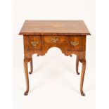 A George II walnut and featherbanded lowboy,