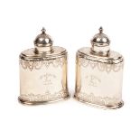 A pair of George I silver tea caddies, maker unknown (probably John Newton), London 1730,