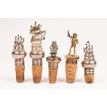 Three Continental silver mounted bottle stoppers, early 20th Century,