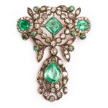 An early 19th Century emerald and diamond brooch of openwork form,