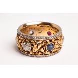 A late 19th Century French gold and multi gem-set ring,