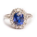 An early 20th Century sapphire and diamond cluster ring,