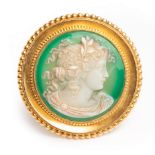 A late 19th Century chrysoprase circular cameo brooch,