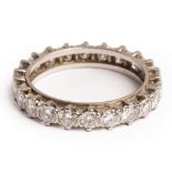 A diamond eternity ring, set with twenty-two round brilliant cut diamonds, each approximately 0.