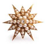 A late 19th Century diamond and pearl metamorphic twelve-point star brooch/pendant,