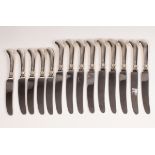 A set of nine silver handled table knives, ELP,